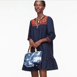 Embroidered popover dress with ruffle hem